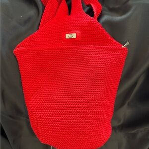 The Sak Red Crochet Backpack bag zipper closure